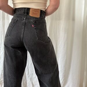 Vintage Levi’s 550 jeans washed black relaxed fit tapered leg very clean 90s
